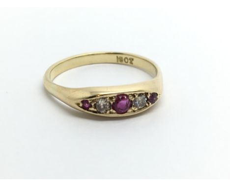 An 18ct gold ruby and diamond five stone ring, approx 3.9g and approx size R.