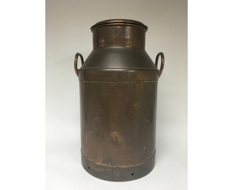 A Vintage copper milk churn with raised handles and detachable lid height 60cm.