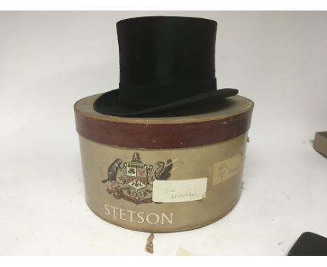 A vintage top hat with oval box London made.