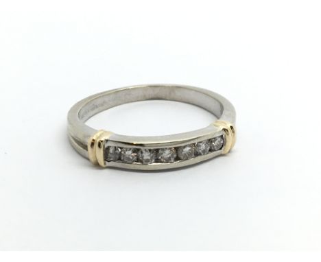 A 9ct gold seven stone half eternity diamond ring, approx .10ct, approx 2.4g and approx size K-L.