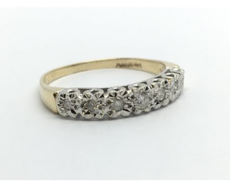 A 9ct gold seven stone half eternity diamond ring, approx 1.8g and approx size O.