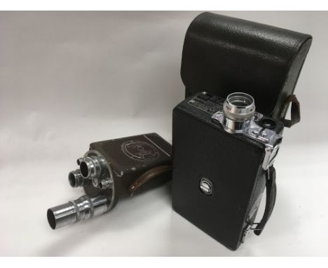 Two unusual vintage nome movie cameras.