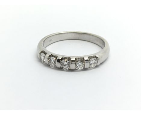 An 18ct white gold five stone diamond ring, approx .60ct, approx 3.1g and approx size K-L.