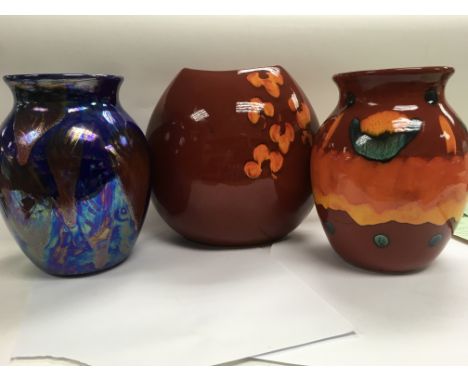 Three contemporary Poole pottery vases .