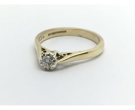 A 9carat gold ring set with a solitaire diamond approximately 0.15 of a carat ring size M.