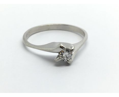 A 9ct white gold solitaire diamond ring, approx.20ct, approx 2g and approx size L.