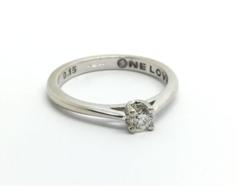 An 18ct white gold solitaire diamond ring, approx .15ct, approx 2.7g and approx size L.