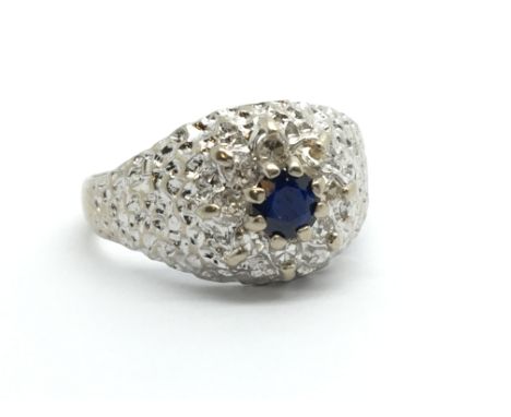 An 18ct white gold sapphire and diamond cluster ring, approx 4.3g and approx size N.