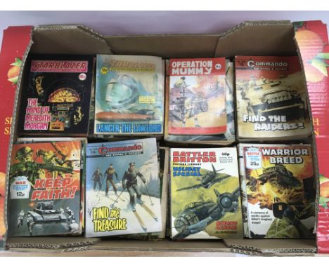 A collection of vintage comic books including Commando, Starblazerand others.