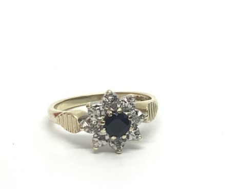 A 9ct gold sapphire and diamond cluster ring, approx 2.4g and approx size I-J.