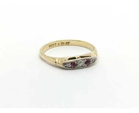 A Vintage 18carat gold ring set with ruby and diamonds. ring size J-K