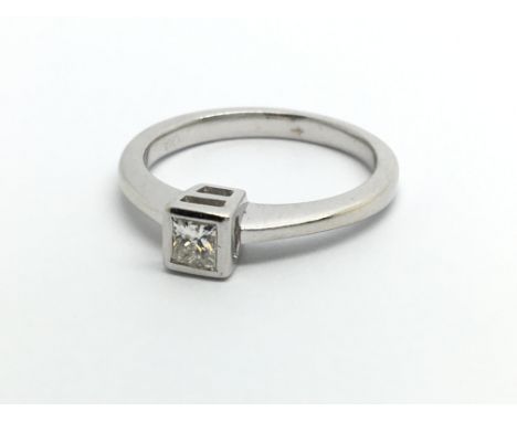 An 18ct white gold princess cut solitaire diamond ring, approx.20ct, approx 3g and approx size J.