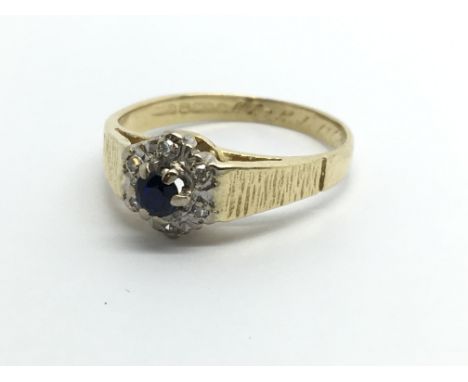 An 18ct gold sapphire and diamond ring, approx 2.8g and approx size I-J.