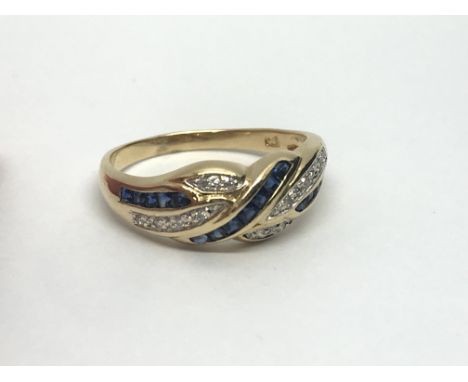 An 18ct gold sapphire and diamond ring, approx 3.4g and approx size O.