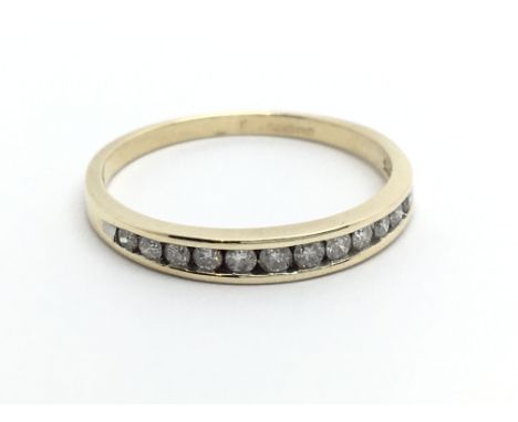 A 9ct gold half eternity diamond ring, approx.20ct, approx 1.5g and approx size P.