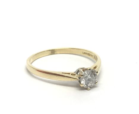 An 18ct gold solitaire diamond ring, approx .33ct, approx 1.9g and approx size N-O.