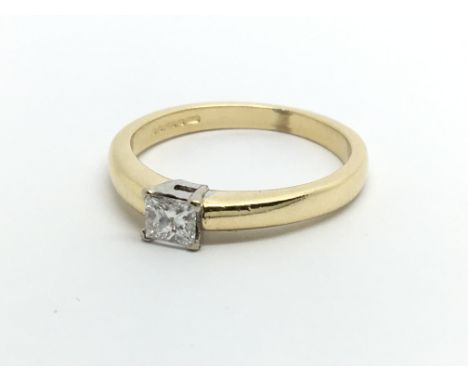 An 18ct gold solitaire diamond ring set with a princess cut diamond, approx .33ct, approx 3.4g and approx size K.