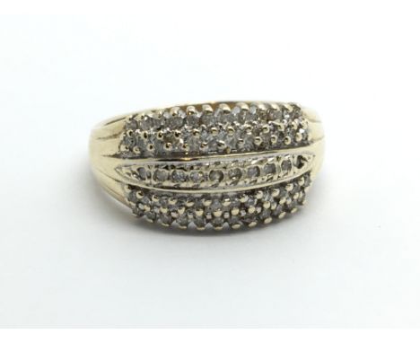 A 9ct gold diamond cluster ring, approx.25ct, approx 3.5g and approx size O.