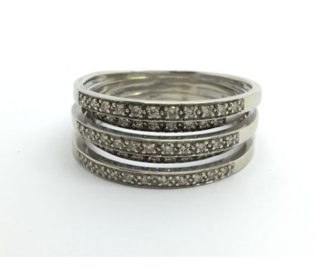 A 9ct white gold five row half eternity ring, approx 1/2ct, approx 7g and approx size S-T.