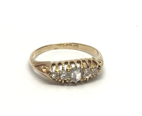 A vintage 18ct gold five stone diamond ring, approx 2.2g and approx size J- K.