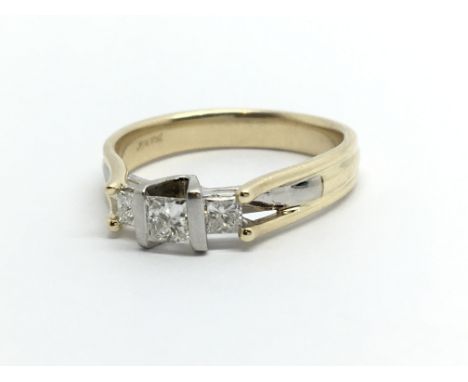 A 9ct gold ring set with three princess cut diamonds, approx .25ct, aporox 2.7g and approx size K-L.