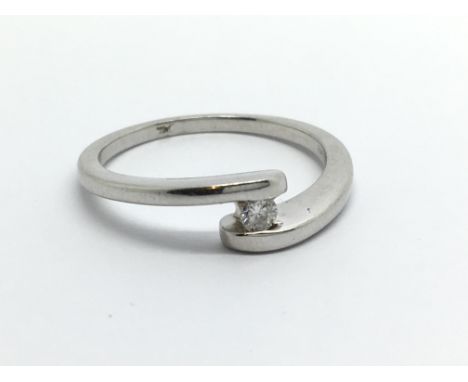 An 18ct white gold six point solitaire diamond ring, approx 2.8g and approx size L-M.