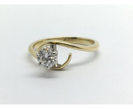 An 18ct gold solitaire diamond ring, approx .25ct, approx 1.9g and approx size H-I.