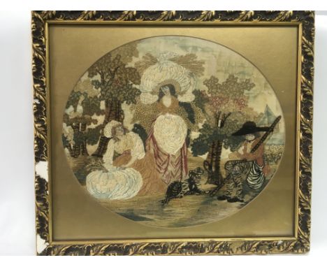 An antique framed tapestry picture of figures in a wooded setting, approx 46cm x 41cm.