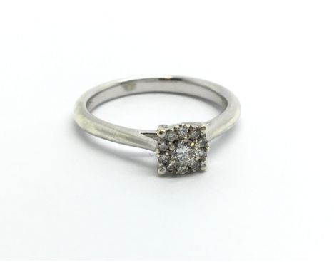 A 9ct white gold diamond cluster ring, approx 1.5ct, approx 2.4g and approx size J.