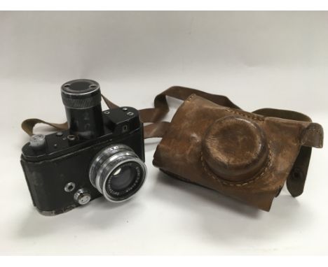 A rare 1930s Carl Zeiss Jena Robot II camera with leather case. This camera is of a type known to have been used by the Germa