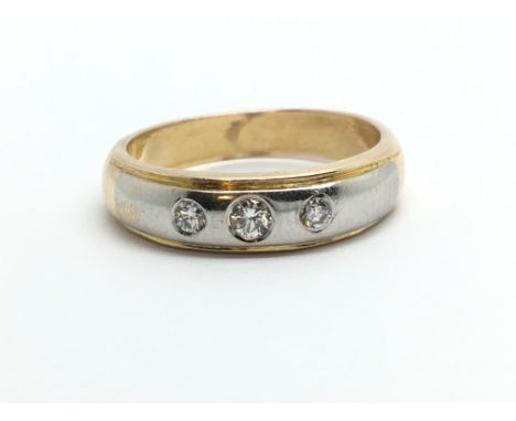 An 18ct white gold three stone diamond ring, approx.15ct, approx 5.5g and approx size M.