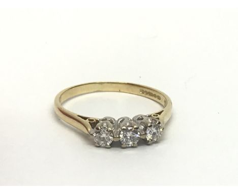 An 18ct gold three stone diamond ring, approx.25ct, approx 1.8g and approx size J-K.