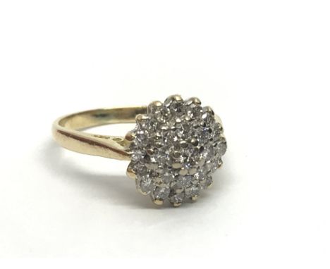 An 18ct gold diamond cluster ring, approx 1/2ct, approx 3g and approx size G-H.