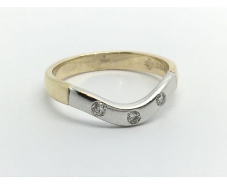 A 9ct gold three stone diamond ring, approx .10ct, approx 2.2g and approx size M.