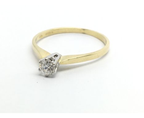 An 18ct gold solitaire diamond ring, approx.20ct, approx 1.7g and approx size N-O.