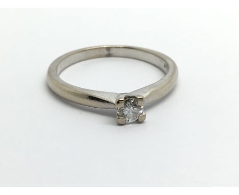 An 18carat white gold ring set with a brilliant cut diamond approximately 0.18 of a carat ring size M-N