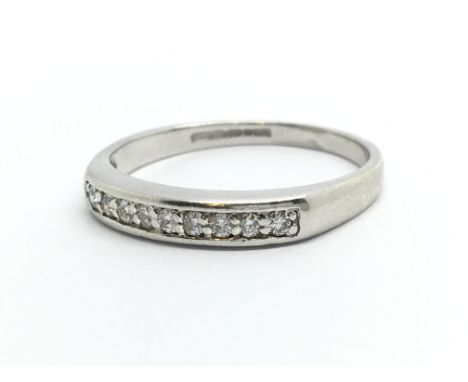 A 9ct white gold nine stone half eternity diamond ring, approx 2.4g and approx size O-P.