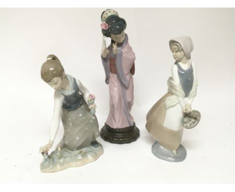 Two Lladro figures a Japanese style figure a girl gathering flowers and a Neo figure (3)