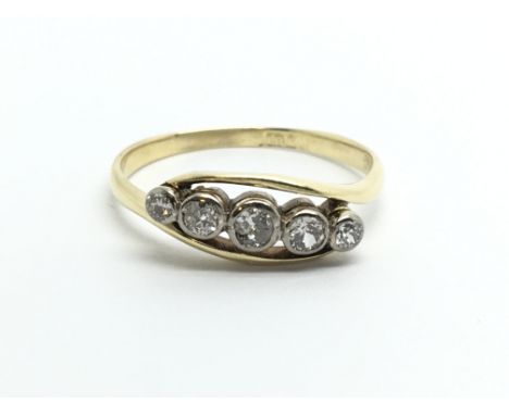 A vintage 18ct gold five stone diamond ring, approx.30ct, approx 2.3g and approx size O.