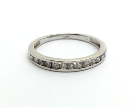 A 9ct white gold half eternity ring, approx.20ct, approx 1.9g and approx size L.