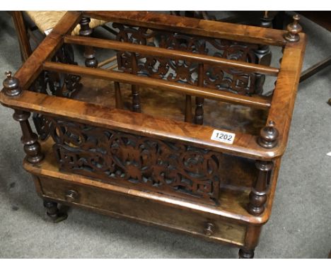 A Victorian burr walnut Canterbury with priced fretwork above a single drawer with pillar supports