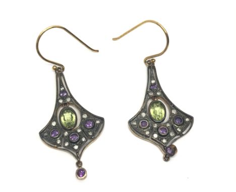 A boxed pair earrings set with peridot, amethyst and diamonds.
