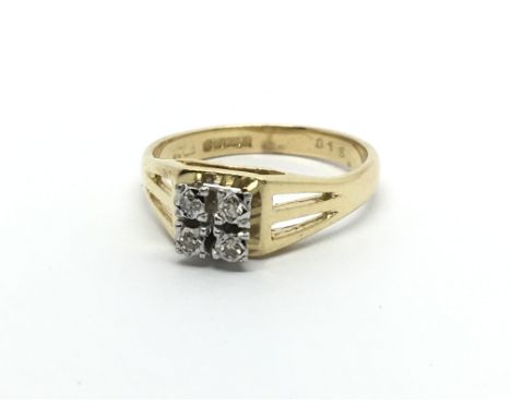 An 18carat gold ring setvwith a square of four brilliant cut diamonds. Ring size N.