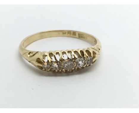 A vintage 18ct gold five stone diamond ring, approx 3.2g and approx size P-Q.