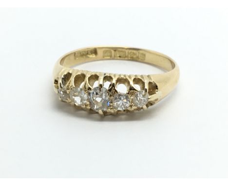 A vintage 18ct gold five stone diamond ring, approx .30ct, approx 3.2g and approx size M.