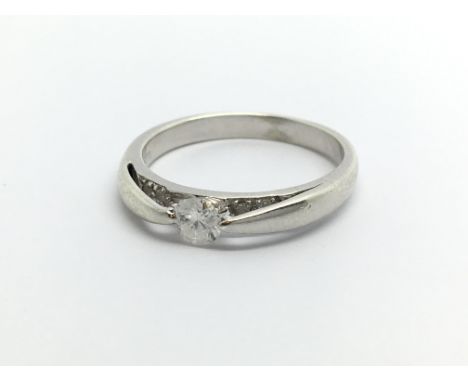 A 9ct white gold solitaire diamond ring, approx.25ct, approx 2.6g and approx size L- M.