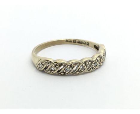 A small 9ct gold half eternity diamond ring, approx 1.3g and approx size K-L.