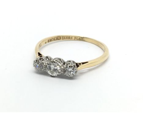 An 18carat ladies ring circa 1930. set with three diamonds approximately 0.33 of a carat. Ring size O-P.