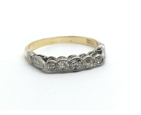 An 18ct gold five stone diamond ring, approx.20ct, approx 1.9g and approx size K-L.