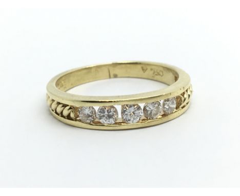 An 18ct gold five stone diamond ring, approx 1/2ct, approx 3.2g and approx size M.